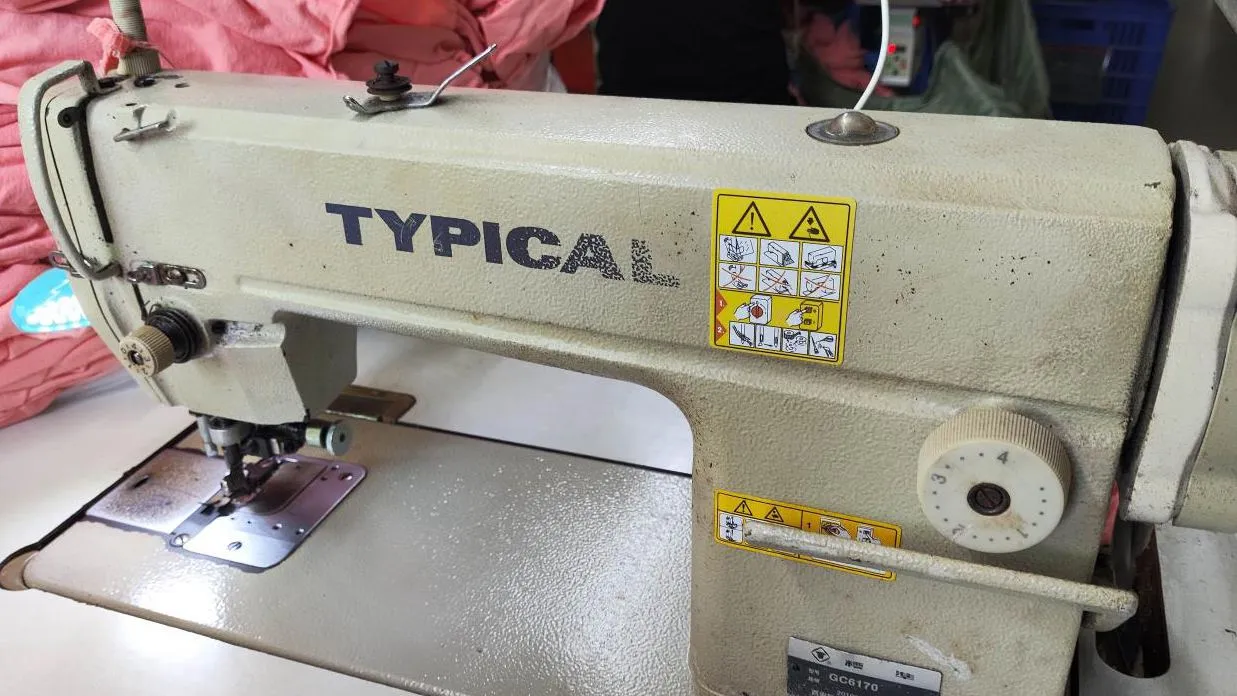 Sewing machines on production line